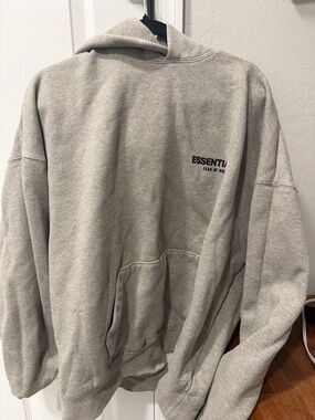 Essentials Light Grey Pullover Hoodie with Black Patch Logo